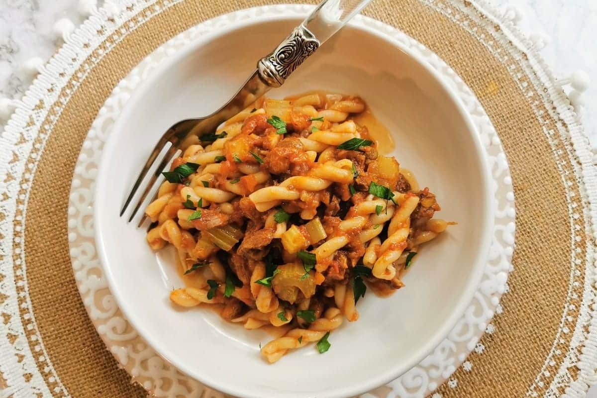 A comforting winter dinner of pasta with meat and herbs.