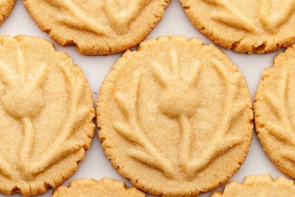 A group of cookies with a leaf design on them.
