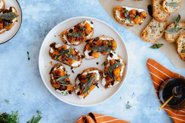 Roasted squash bruschetta with goat cheese and sage.