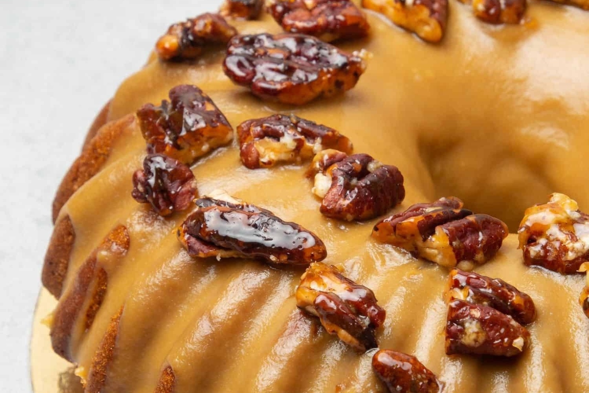 A delicious bundt cake with a decadent caramel and pecan topping.