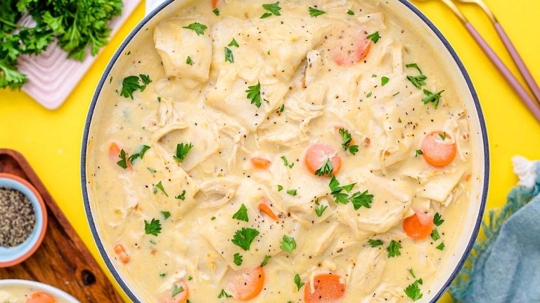 A can of chicken noodle soup on a yellow background.