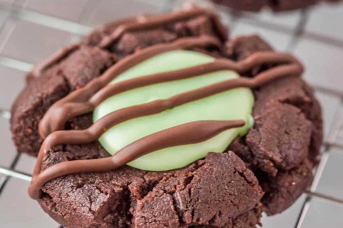 Chocolate Mint Thumbprint Cookies on a wire rack.