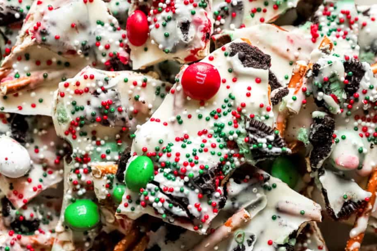 Christmas bark with Oreo cookies, sprinkles, and candy canes.