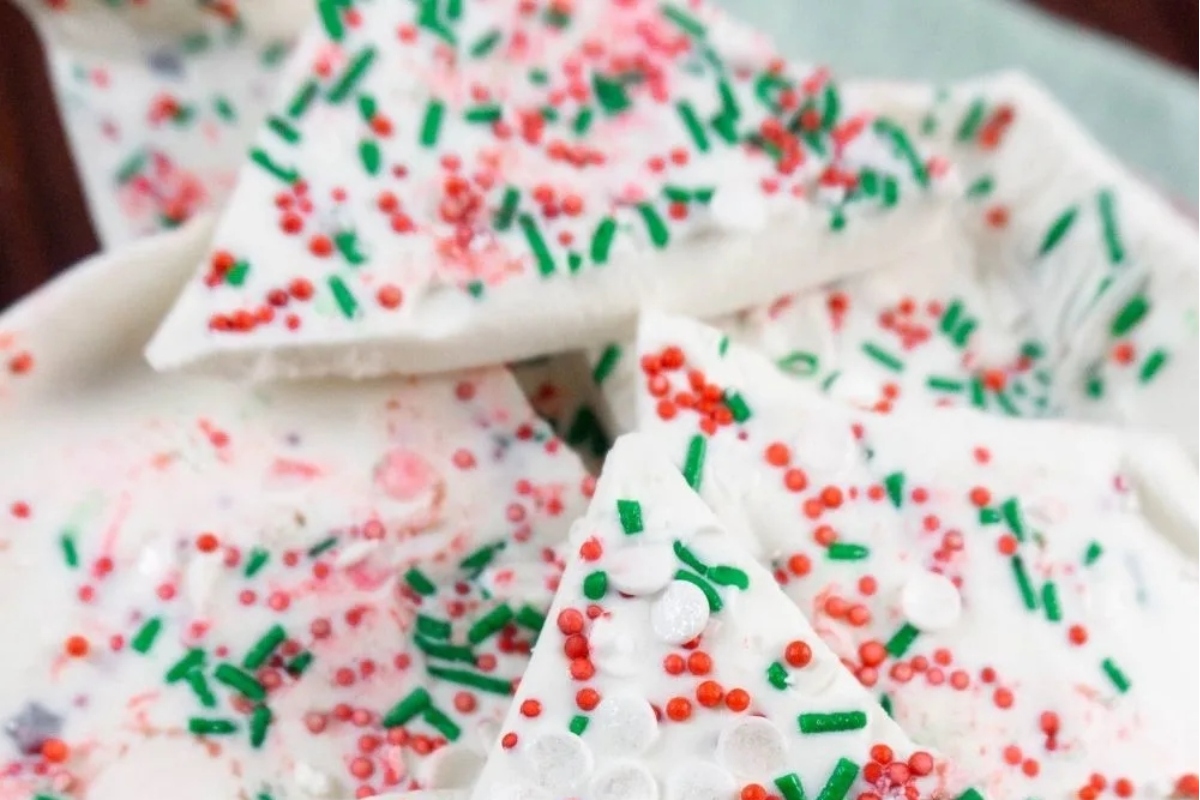 A festive Christmas bark adorned with sprinkles.