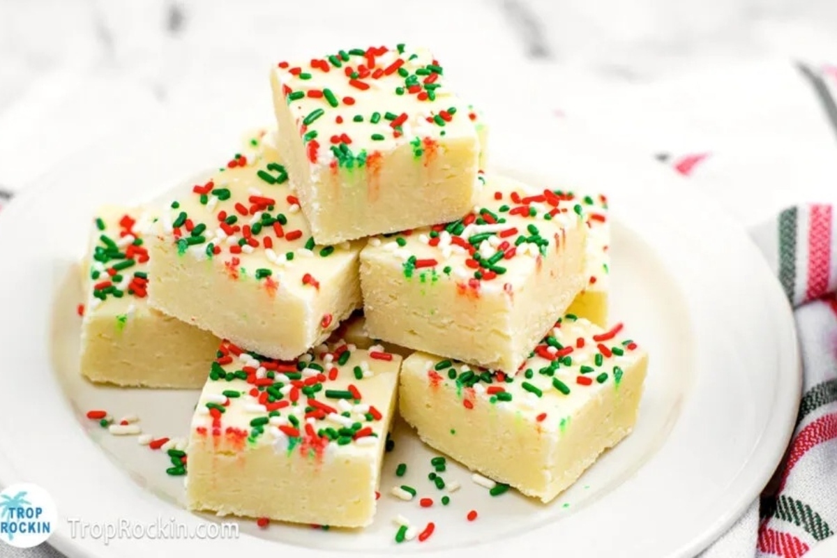 Edible Christmas fudge on a white plate.