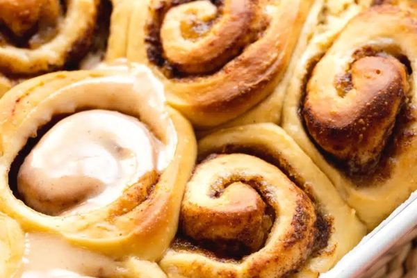 Delicious homemade cinnamon rolls baked to perfection in a dish.