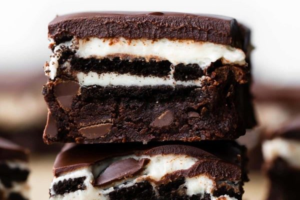 Irresistible chocolate oreo brownies, perfect for those craving a decadent treat. These indulgent brownies are expertly layered, creating a mouthwatering dessert that combines the