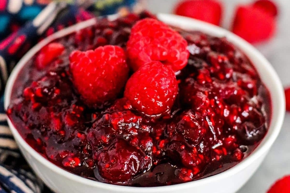 Cranberry sauce in a white bowl.