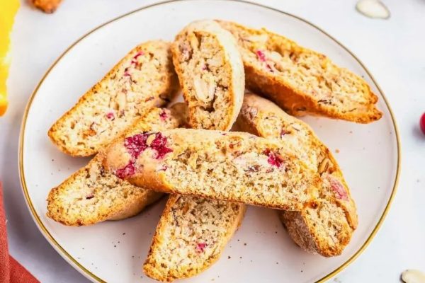 Cranberry almond biscotti on a plate.