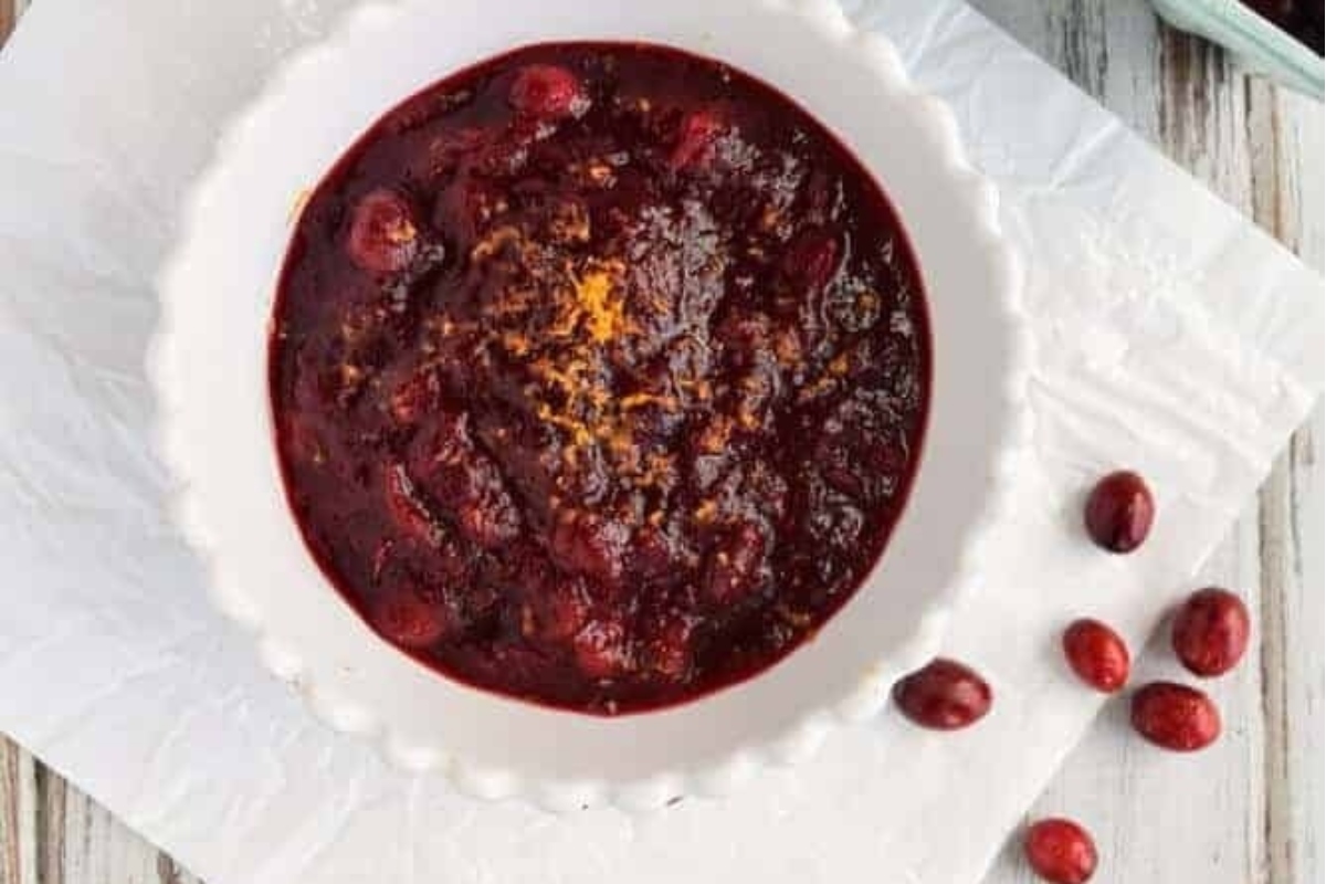 Cranberry sauce recipe in a white bowl.