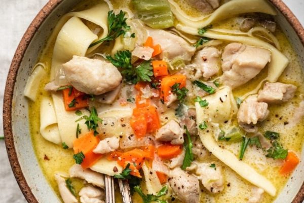Chicken noodle soup in a bowl.