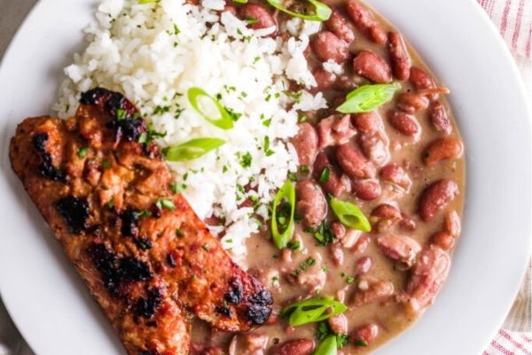 A plate with rice and beans on it.