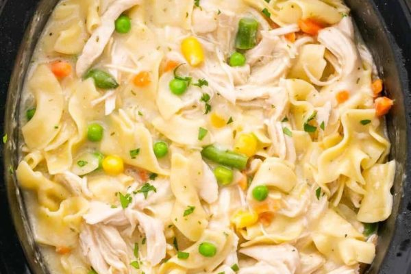 Chicken noodle soup in a crock pot.