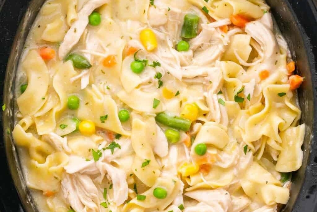 Chicken noodle soup in a crock pot.