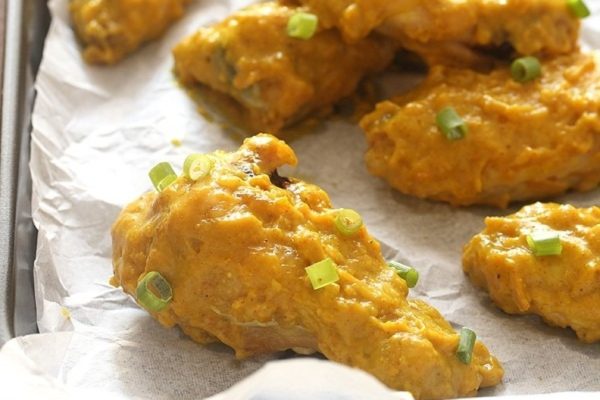 Game Day just got tastier with a tray of sizzling wings placed enticingly on a baking sheet.