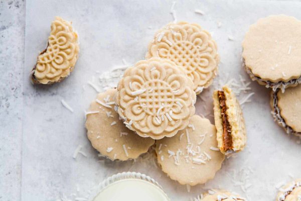 Coconut macaroons with a glass of milk.