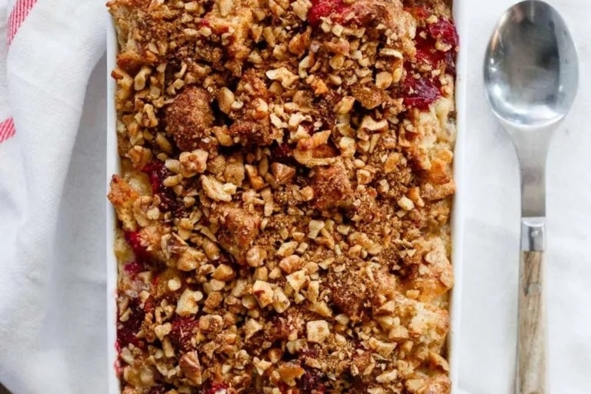 A festive Christmas breakfast recipe consisting of a delicious cranberry crumble topped with crunchy granola.