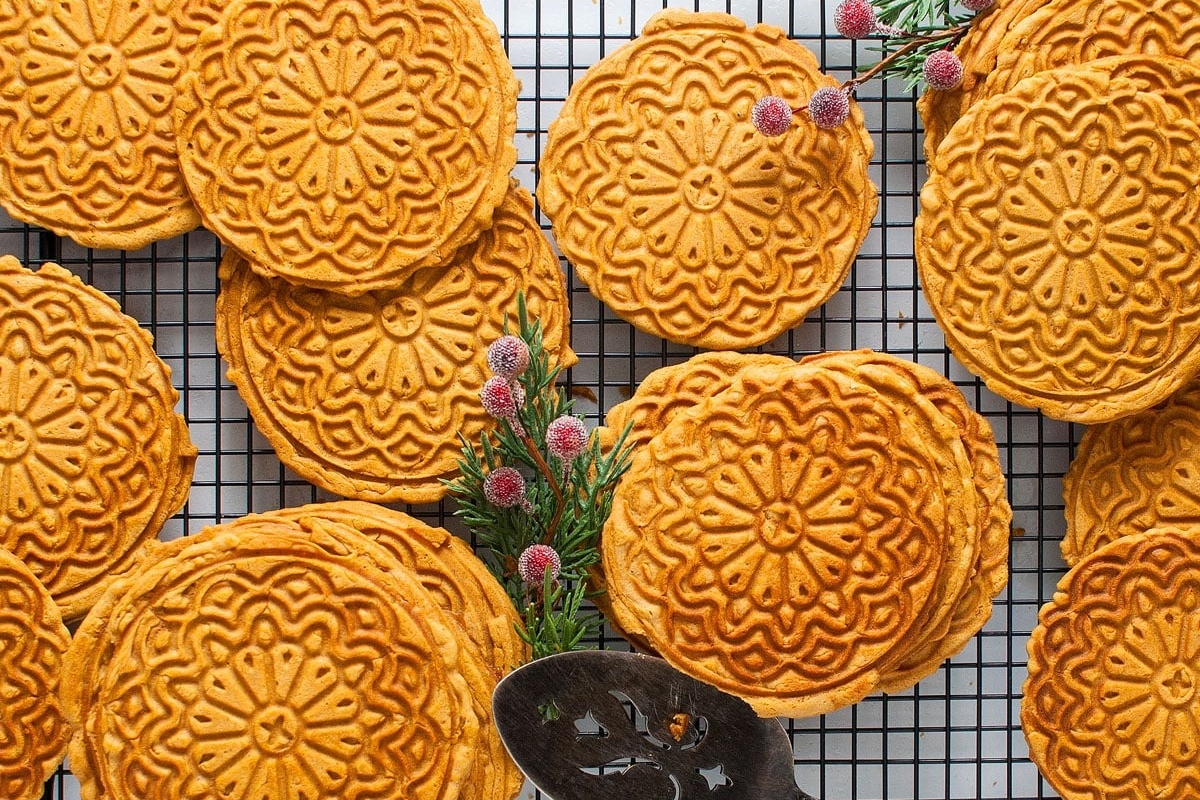 Gingerbread pizzelle on a tray.