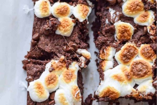 A decadent slice of s'mores brownies, perfectly combining the rich flavors of chocolate and toasted marshmallows.