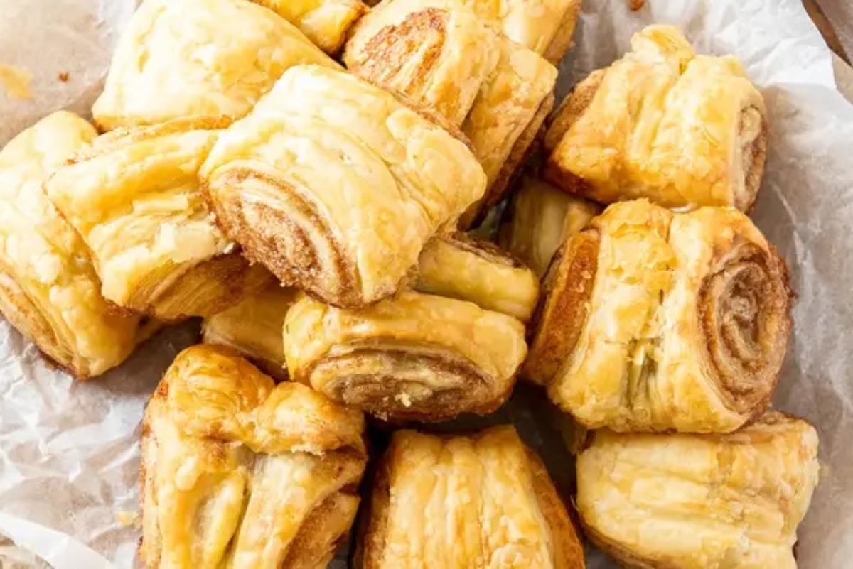 A pile of German pastries on a piece of paper with recipes.