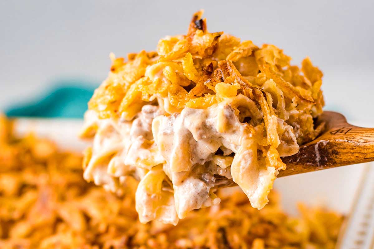 A spoonful of cheesy tater tot casserole.