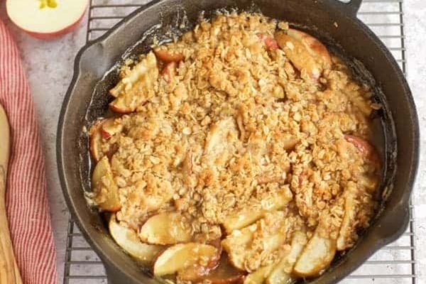 Apple crisp in a cast iron skillet.