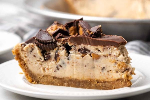 A slice of peanut butter pie on a plate.