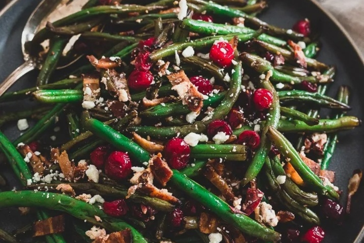 Turkey Sides with green beans and cranberries on a plate.