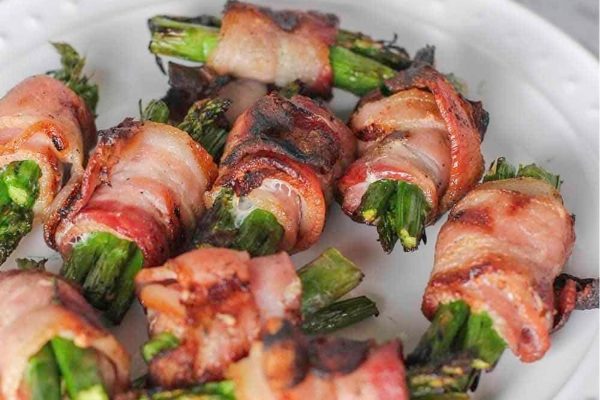 Bacon-wrapped asparagus on a Thanksgiving plate.