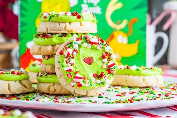 Grinch cookies on a plate.