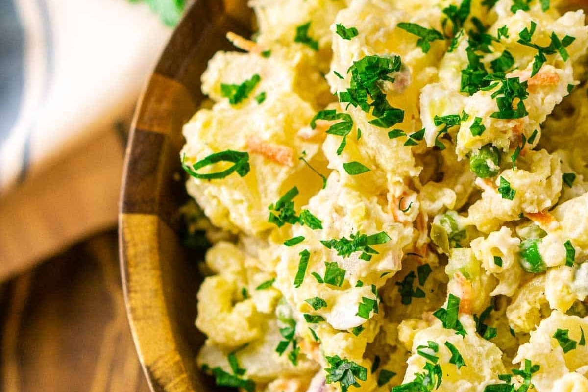 Inspired Hawaiian Potato Salad in a wooden bowl.