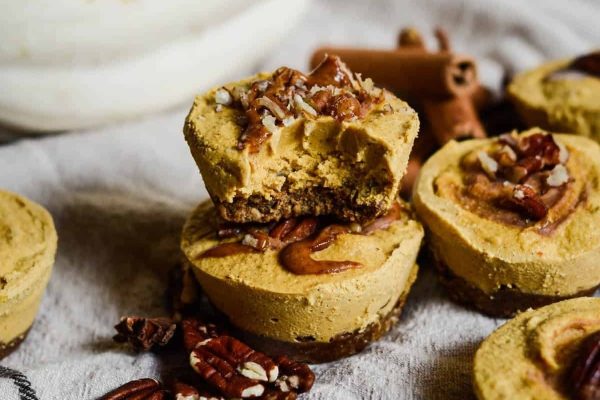 Pumpkin cheesecakes with pecans and walnuts.