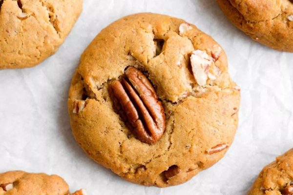 Pecan cookies with pecans on top.