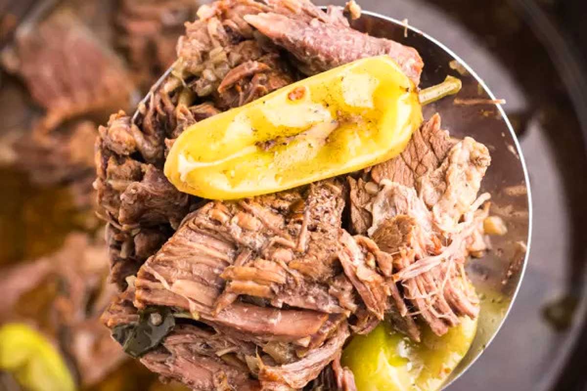 Instant Pot pulled pork with peppers and onions.
