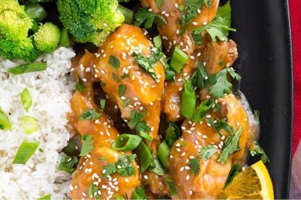 Orange chicken with broccoli on the side.