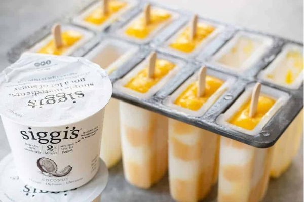 A tray of mango popsicles.