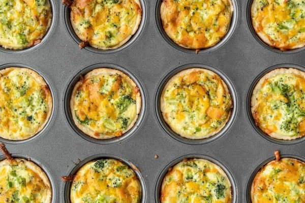 Cheesy broccoli quiche muffins, the perfect bite-sized quiche recipes cooked in a muffin tin.