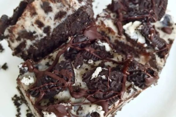 Oreo ice cream bars on a plate.