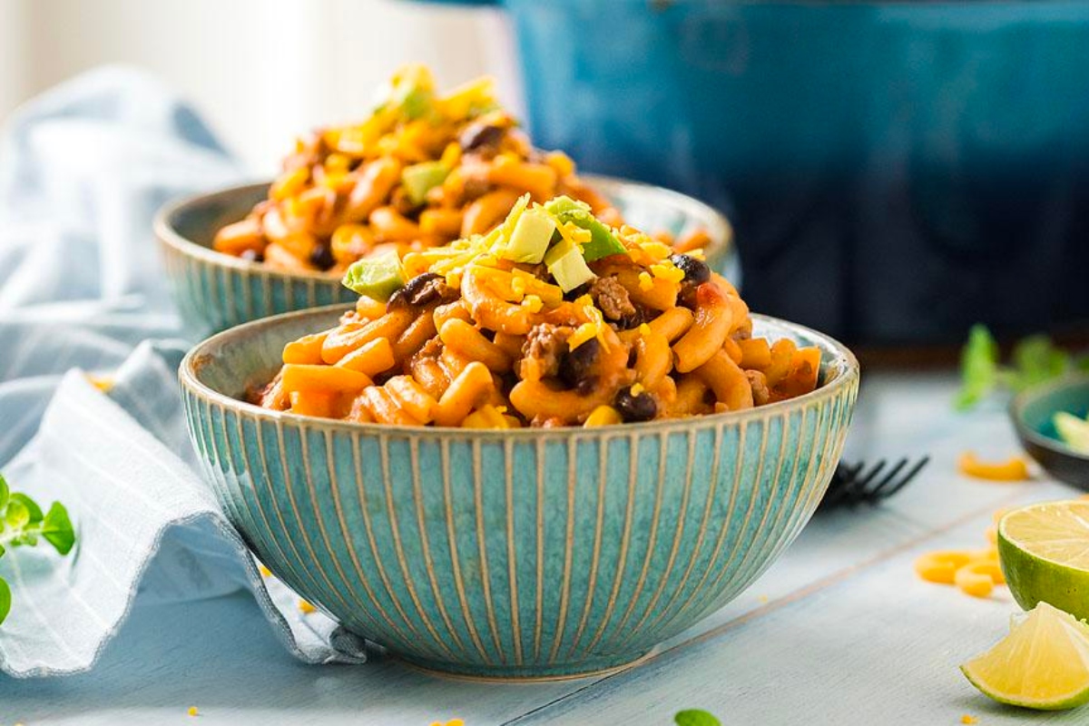 Two bowls of kid-friendly Mexican macaroni and cheese that parents will love.