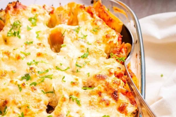 A casserole dish filled with pasta and cheese.
