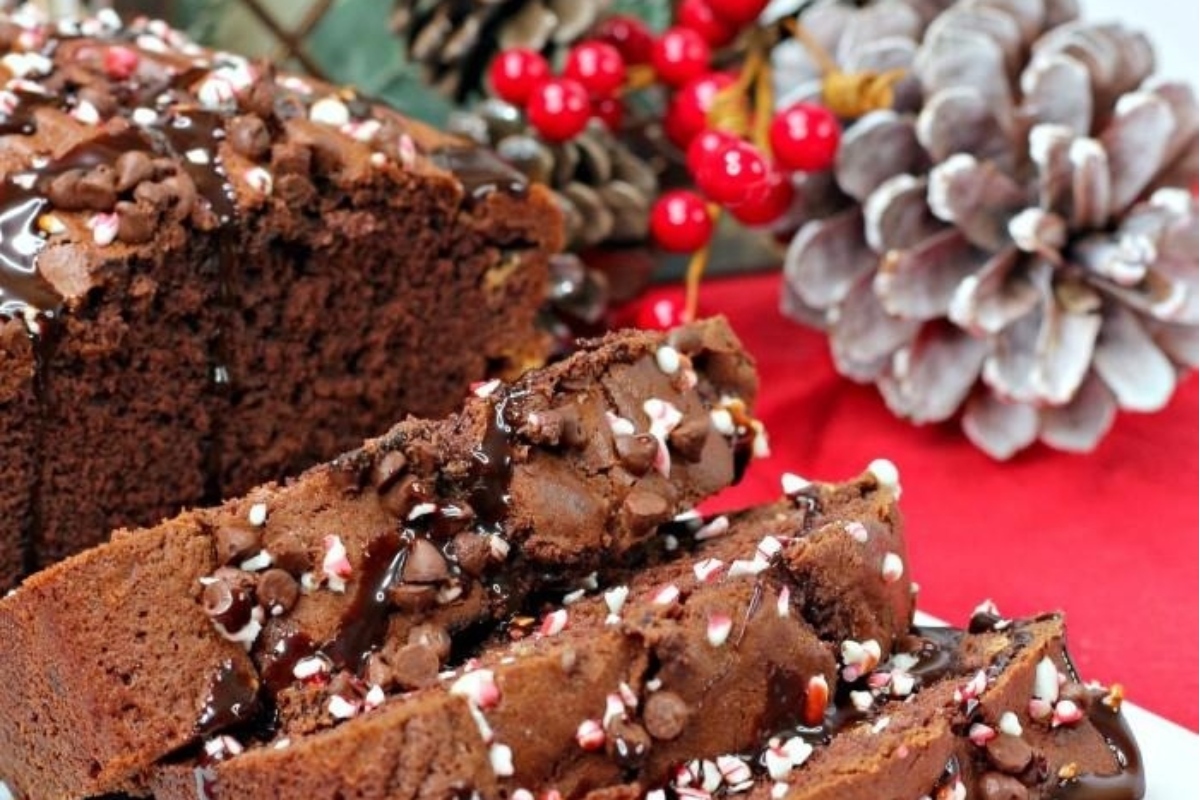 A slice of chocolate peppermint bread, a delicious Candy Cane recipe, on a plate.