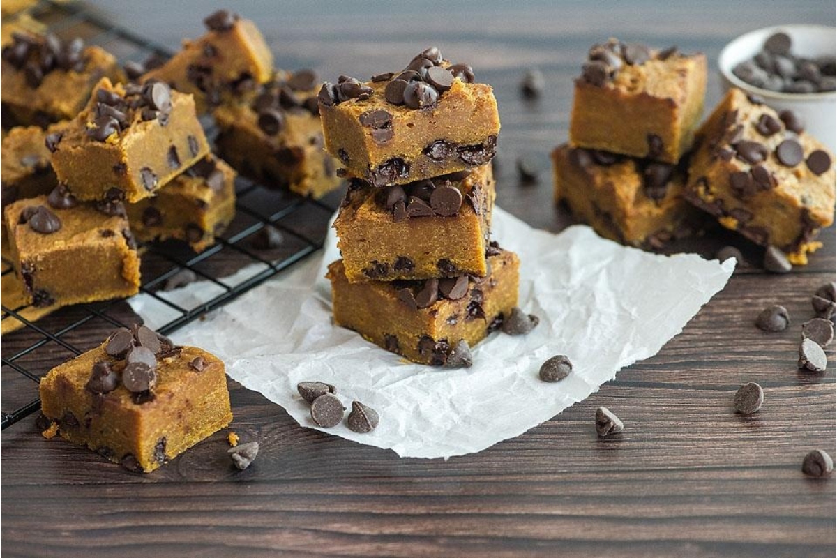 Pumpkin chocolate chip fudge bars on a cooling rack.