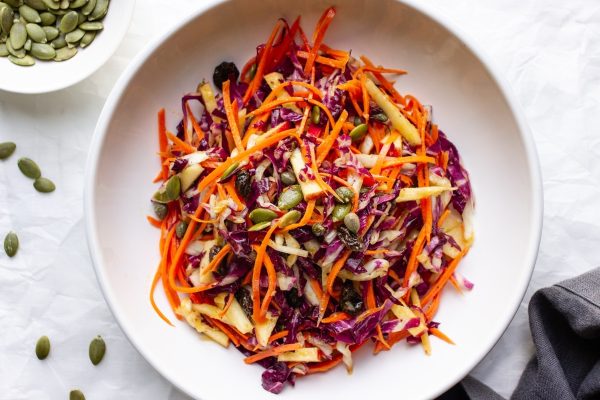 Christmas red cabbage slaw with pumpkin seeds.