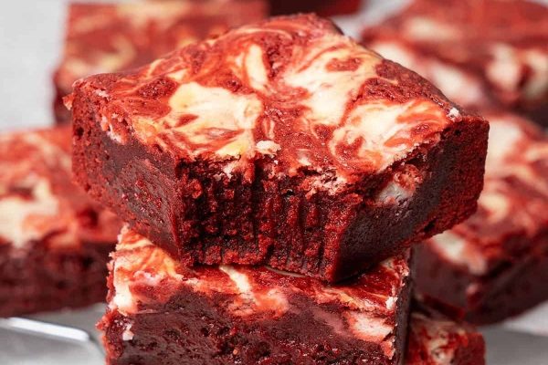 Desserts made with layers of red velvet brownies.