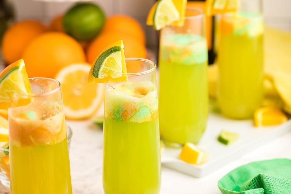 St. Patrick's day cocktails with limes and oranges.