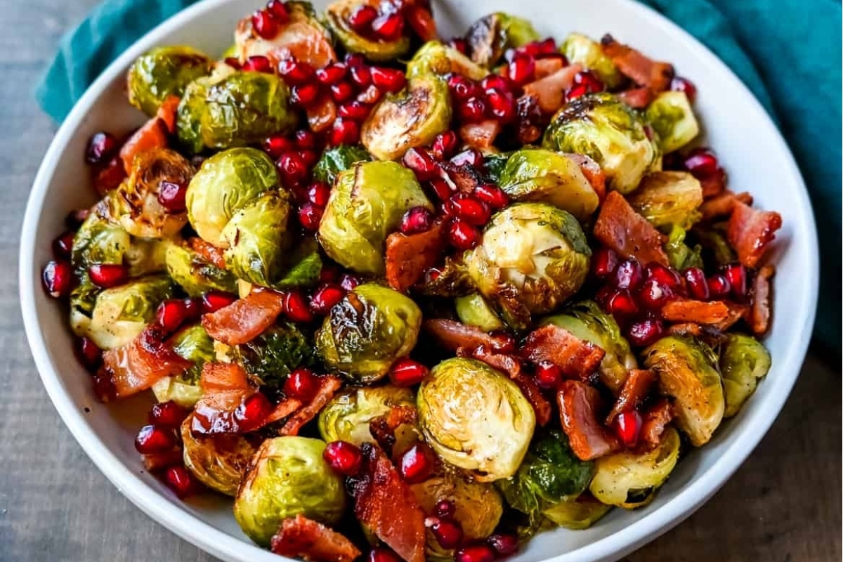 Sheet Pan Brussels Sprouts with Bacon and Pomegranate: A perfect side dish for Thanksgiving or any other occasion. These flavorful Brussels sprouts are roasted to perfection on a sheet pan, combined with