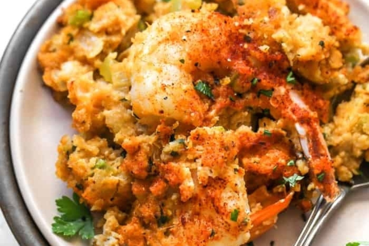Shrimp stuffing recipe served on a plate with a fork.