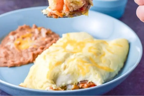 Shrimp Enchiladas in a blue bowl.