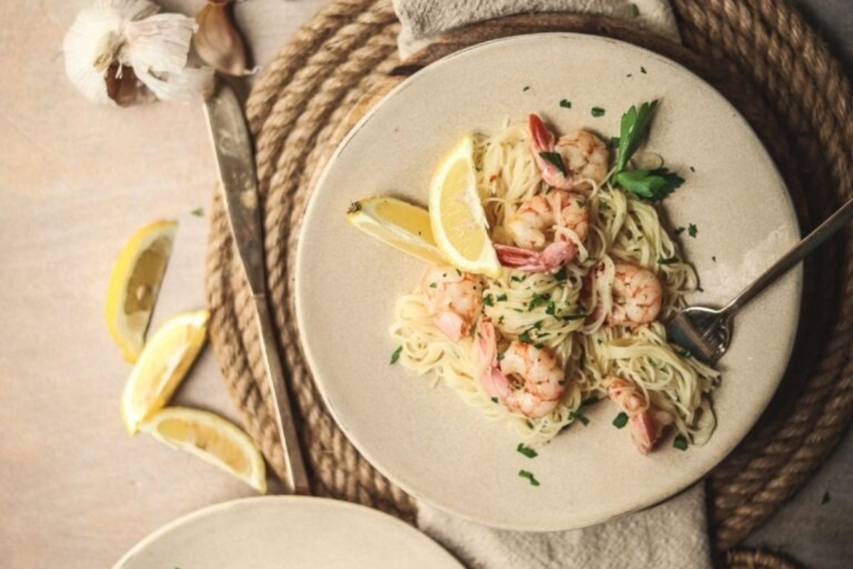 A mouthwatering Feast of pasta with shrimp and lemon, inspired by the Seven Fishes tradition.