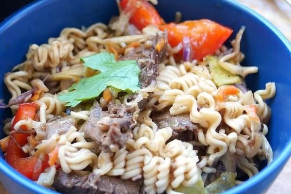 A flavorful ramen recipe featuring a satisfying bowl of noodles with a delectable combination of meat and vegetables.